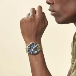 New EMPORIO ARMANI Montre Bleu cadran doré rose/argenté fond bleu bracelet acier argenté/doré