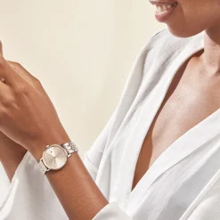 TOMMY HILFIGER Montre Tea Doré cadran argenté fond doré rose bracelet acier bicolore